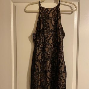 Beautiful black and nude lace dress never worn